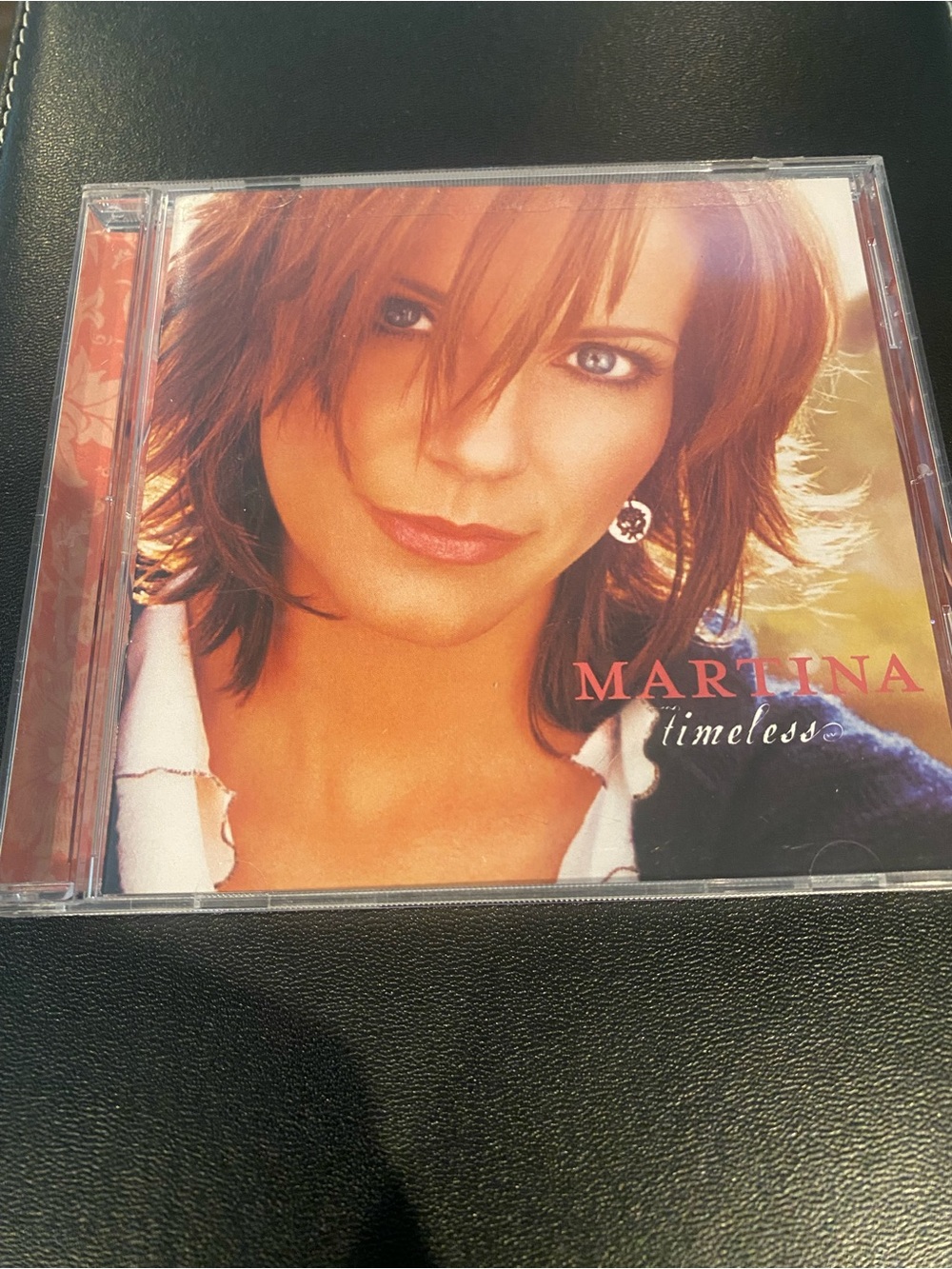 Sony CD Jewel Case with Brown and Pink Album Cover